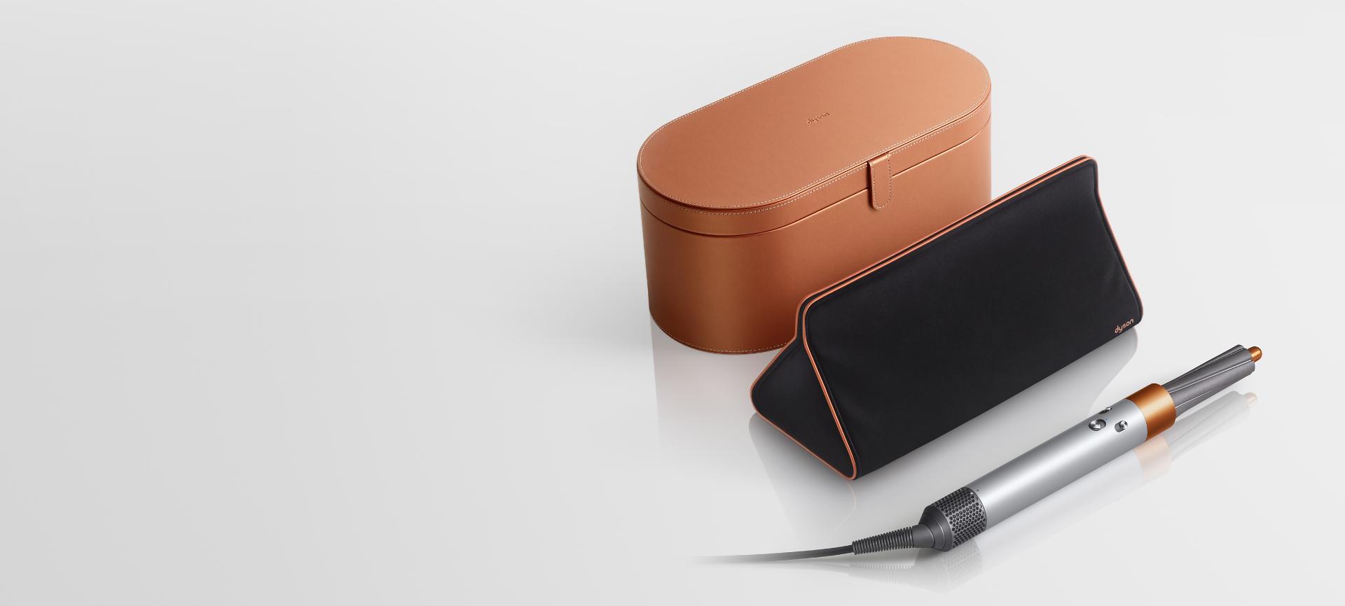Copper Dyson Airwrap styler with presentation case and storage bag