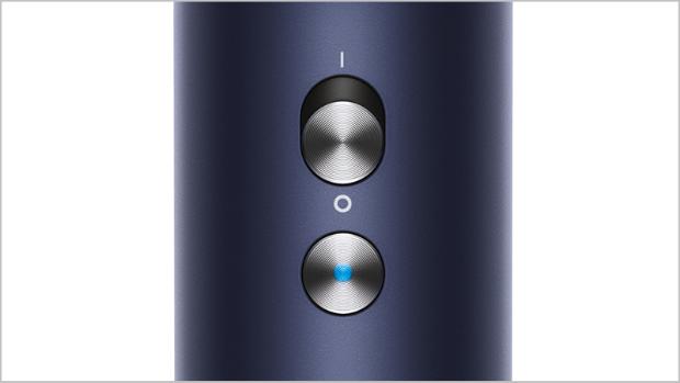 Close-up of the Cold shot button on the Dyson Supersonic.