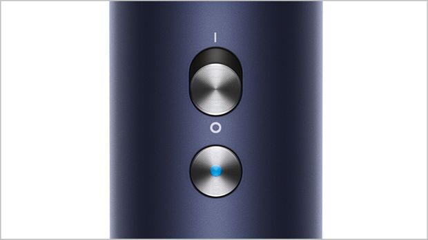 Close-up of the Cold shot button on the Dyson Supersonic.