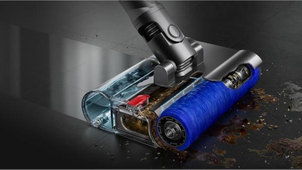 The Submarine wet roller head cleans spills from a tiled floor.