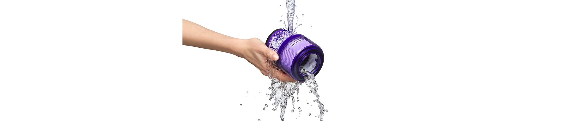 The filter of the Dyson V9 vacuum is rinsed under a stream of water.