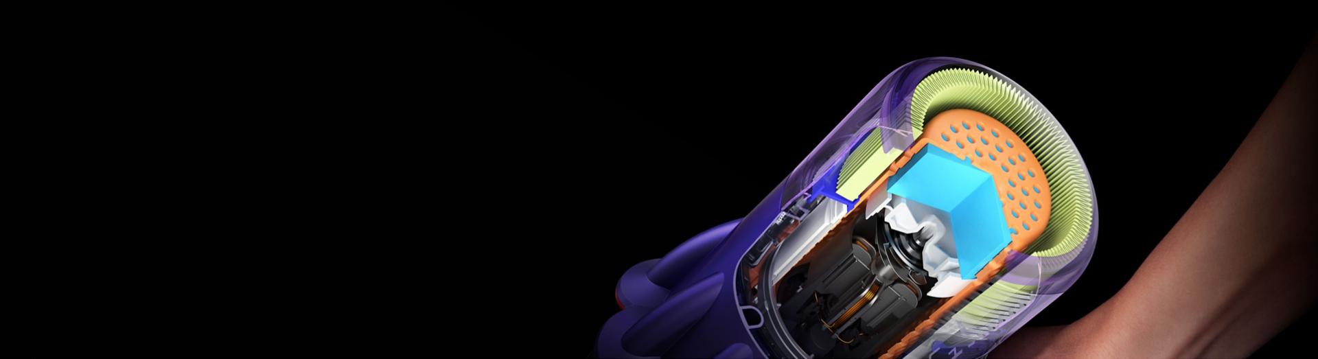 Cutaway of the Dyson V9 vacuum showing the noise reduction technology within.