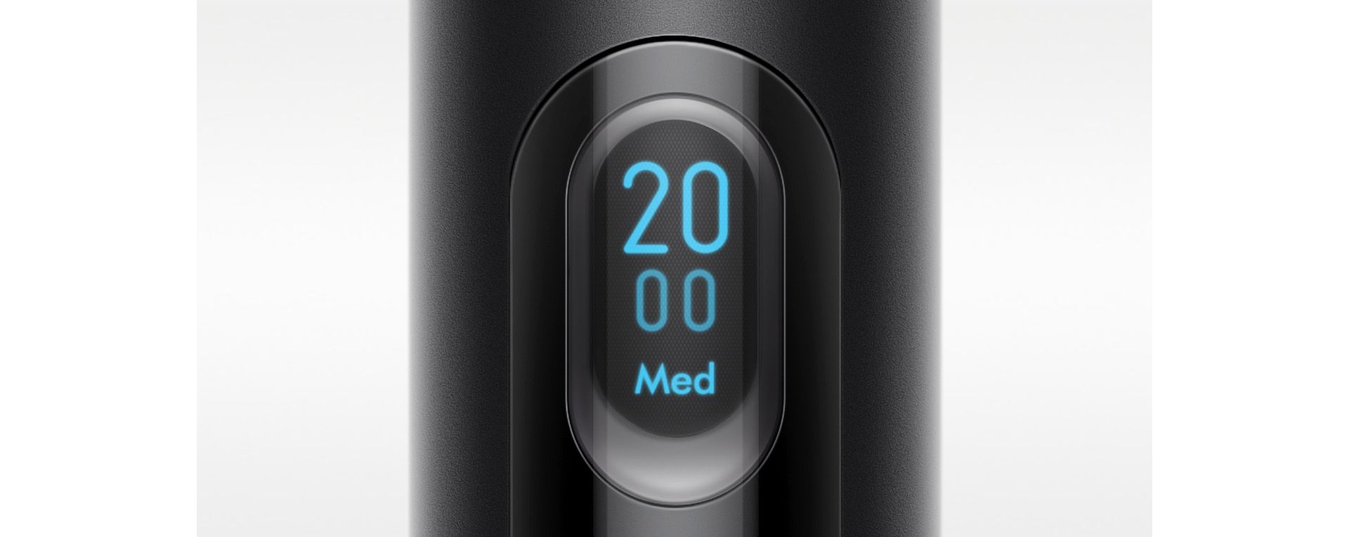 A close up of the LCD screen of the Dyson PencilVac cleaner, showing the number 20 and the Medium symbol