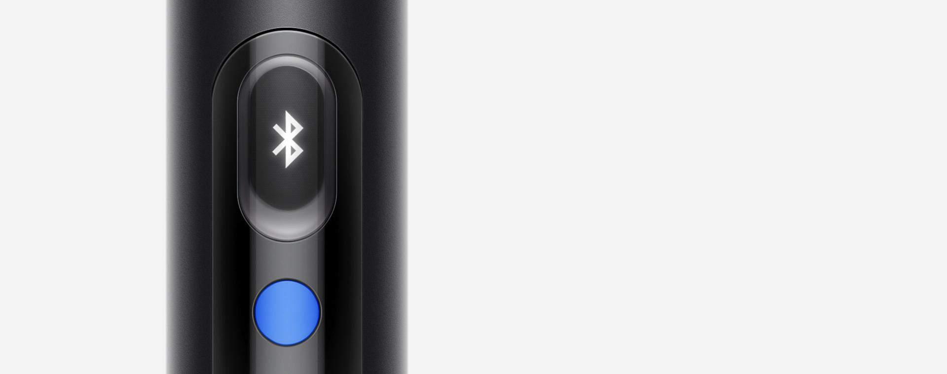 A close up of the LCD screen of the Dyson PencilVac cleaner, showing a Bluetooth symbol