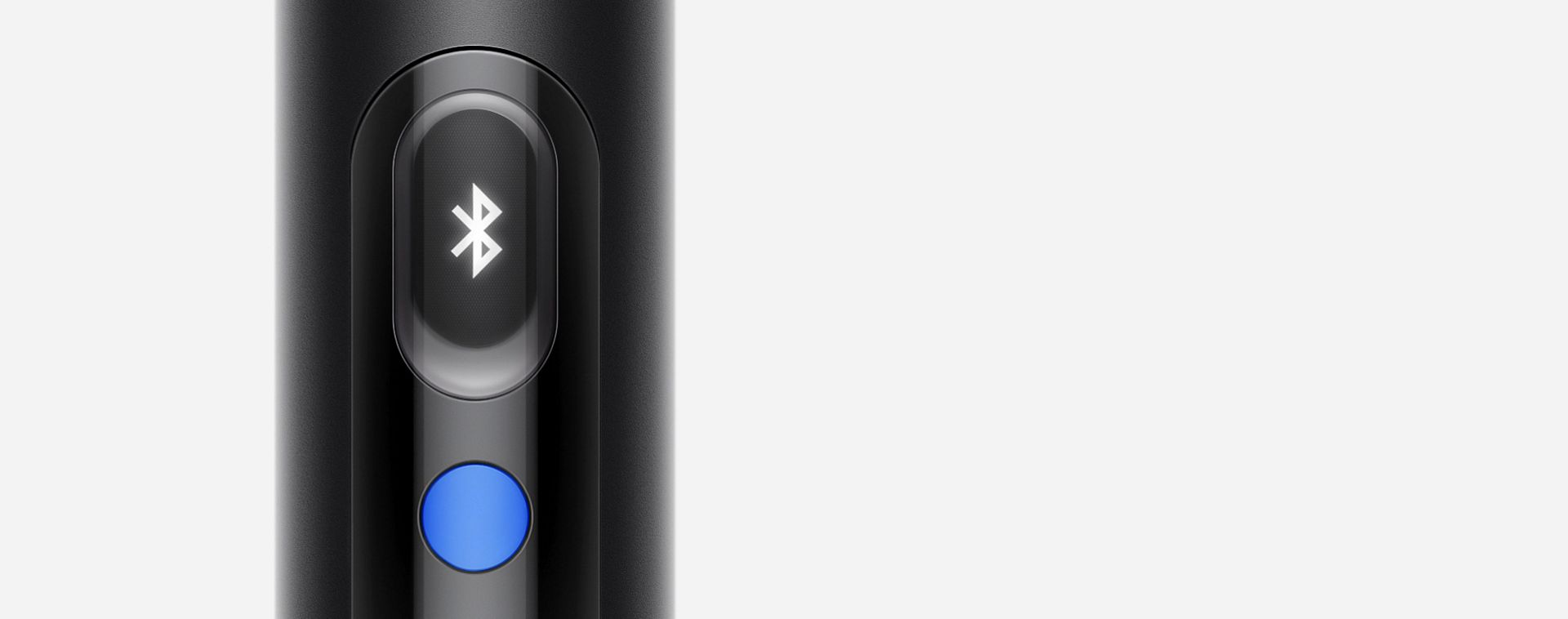 A close up of the LCD screen of the Dyson PencilVac cleaner, showing a Bluetooth symbol