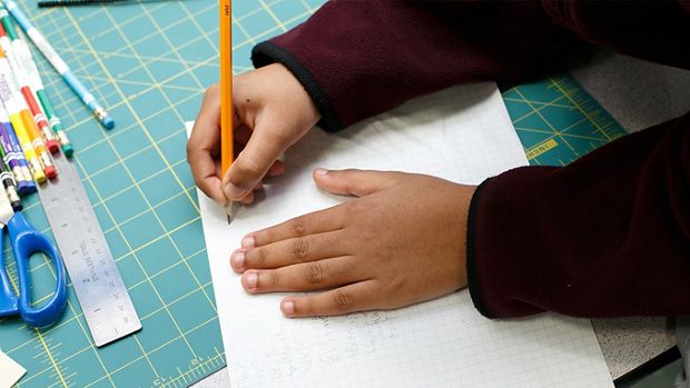 A student sketching out an engineering concept.