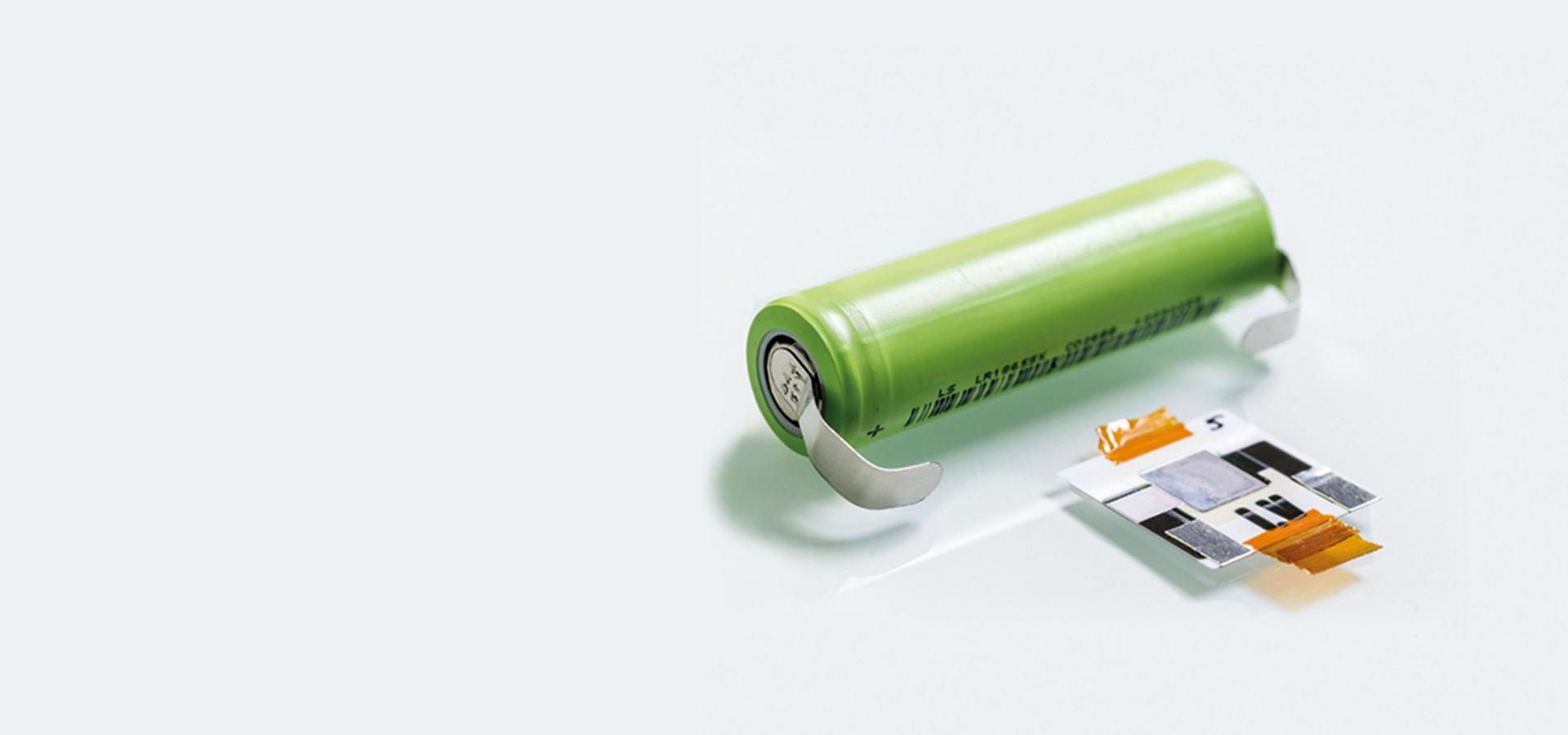 Energy efficient battery cells next to a battery shell.
