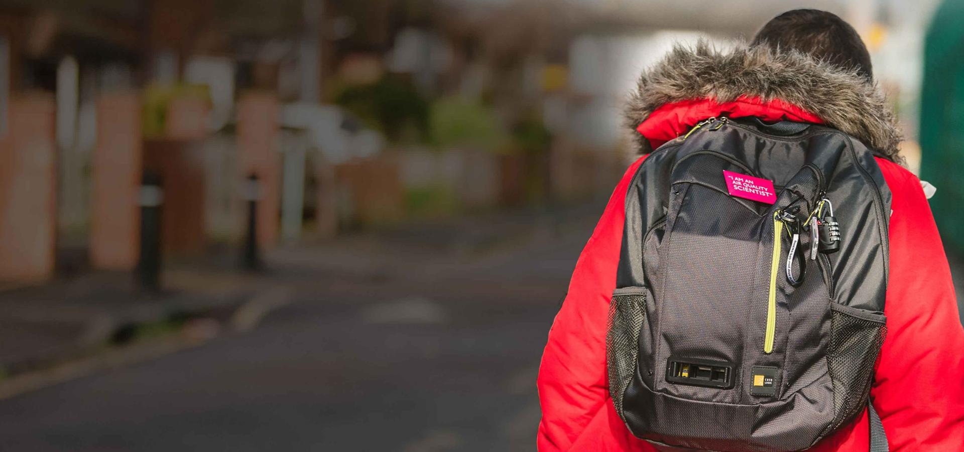 School children wearing Dyson air quality-sensing backpacks.