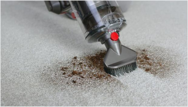 Stubborn dirt brush in use