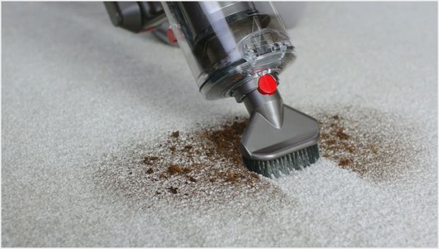 Stubborn dirt brush in use