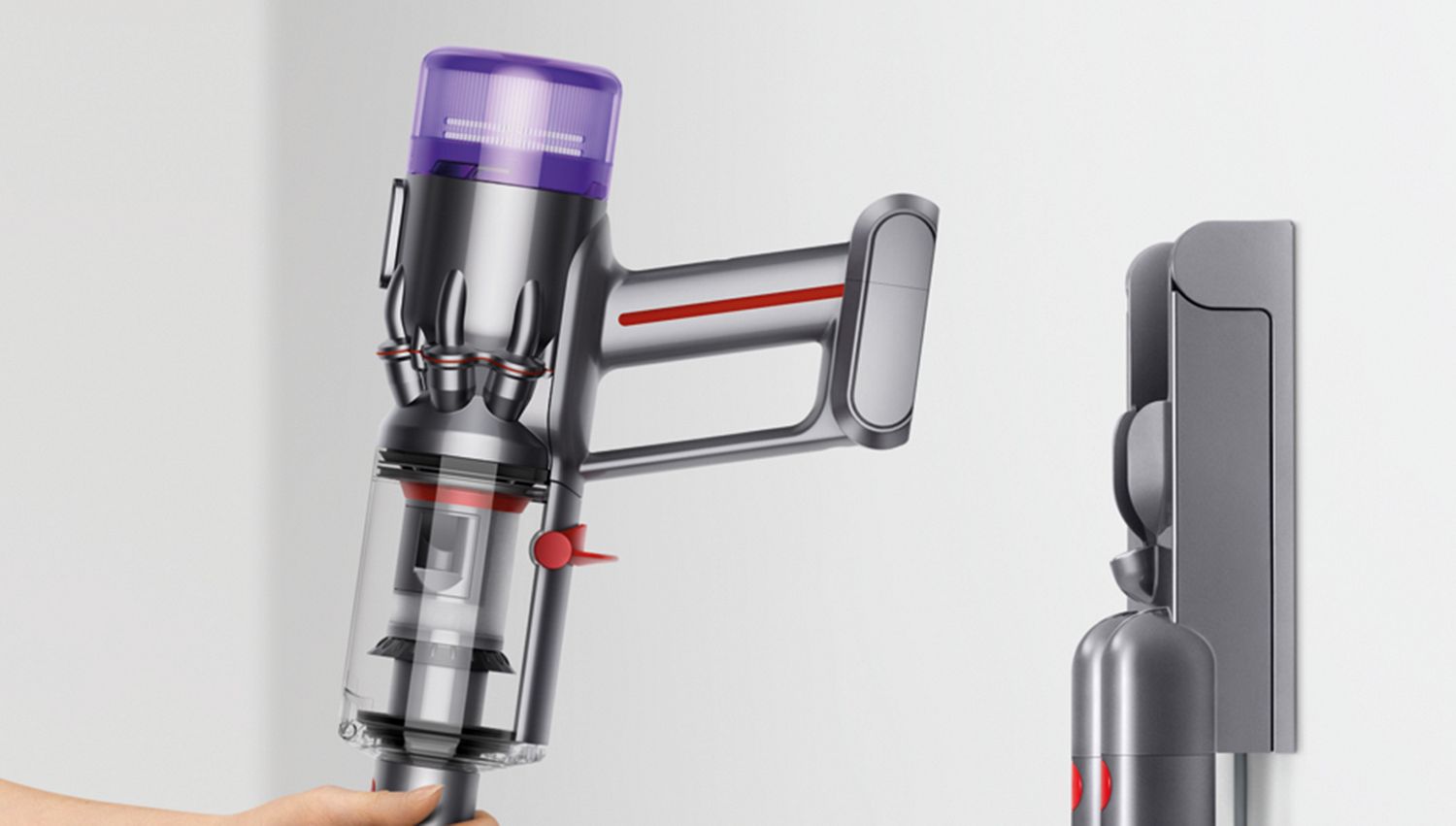 Placing the Dyson Micro 1.5kg vacuum in its wall dock