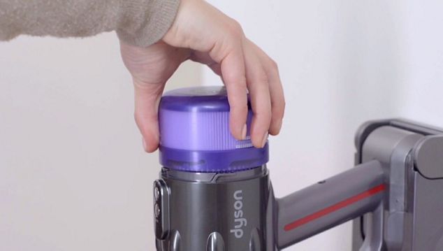 Filter being removed from vacuum