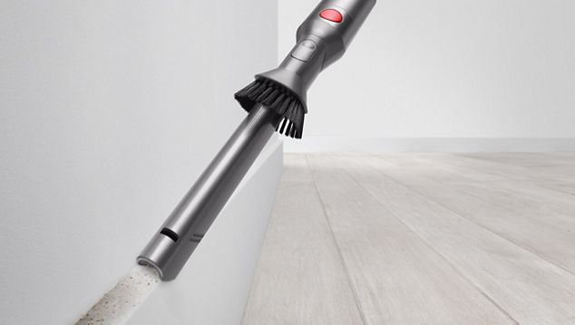   Aspirapolvere Dyson Micro 1,5kg che pulisce il tavolo