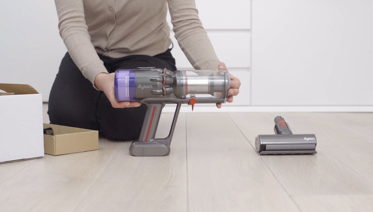 Side view of the Dyson Humdinger handheld vacuum