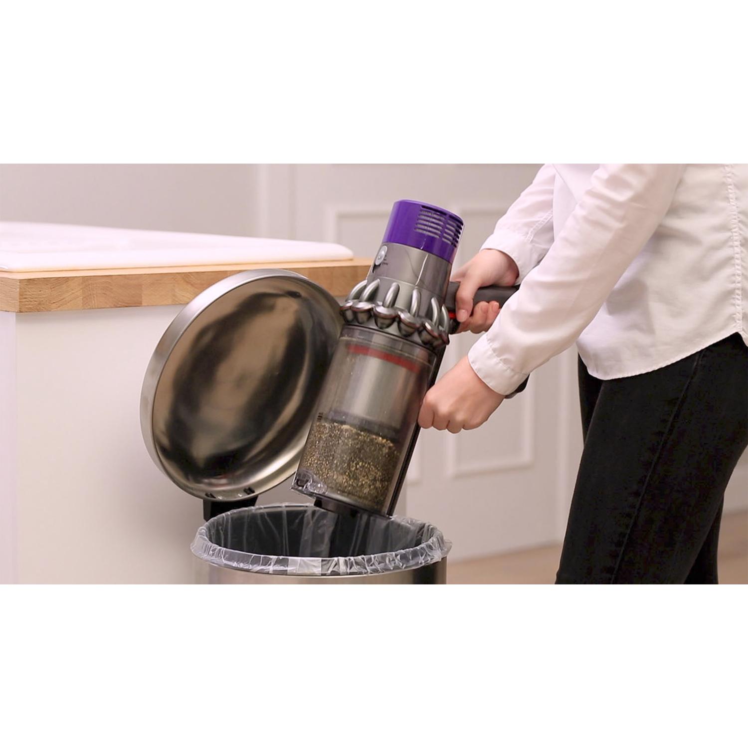Play the video. How to empty the clear bin.