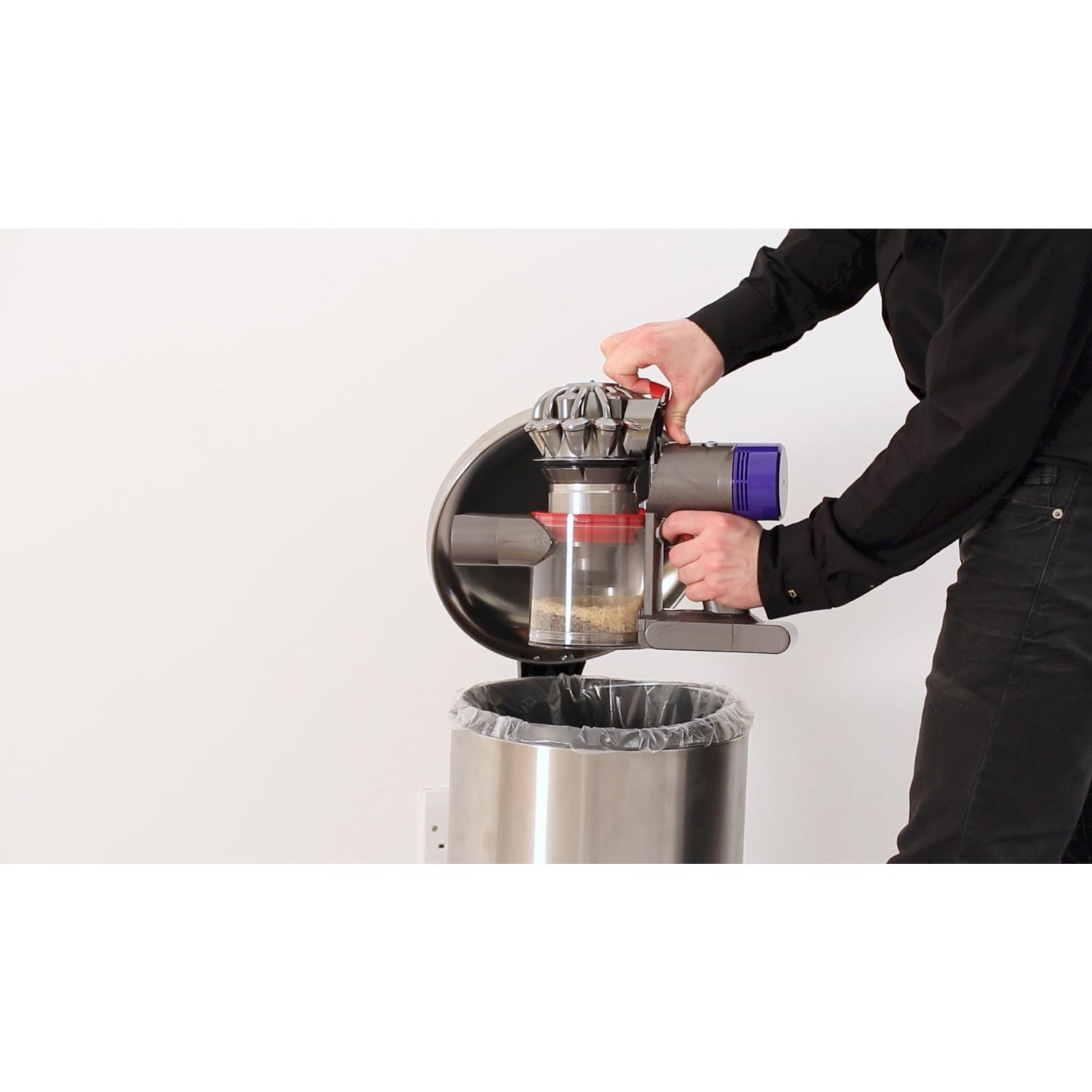 Play the video. How to empty the clear bin.
