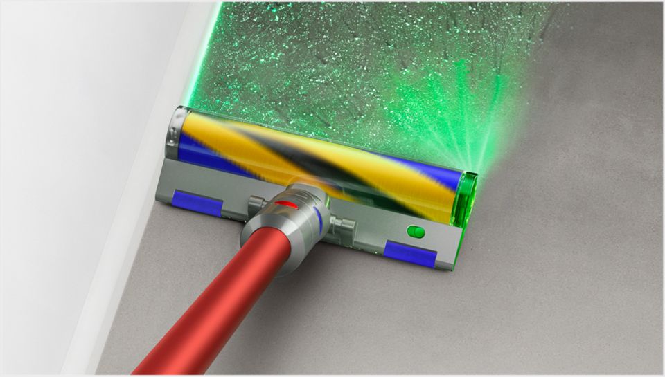 Laser on the cleaner head highlighting dust