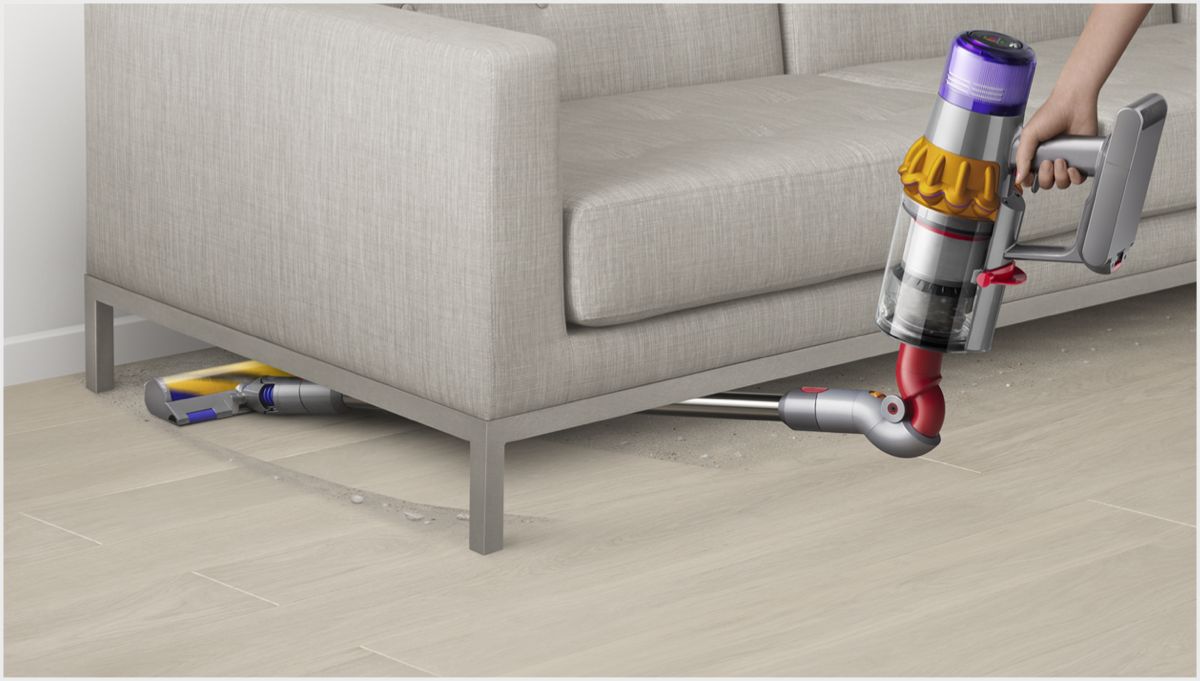 Reach-under tool underneath furniture