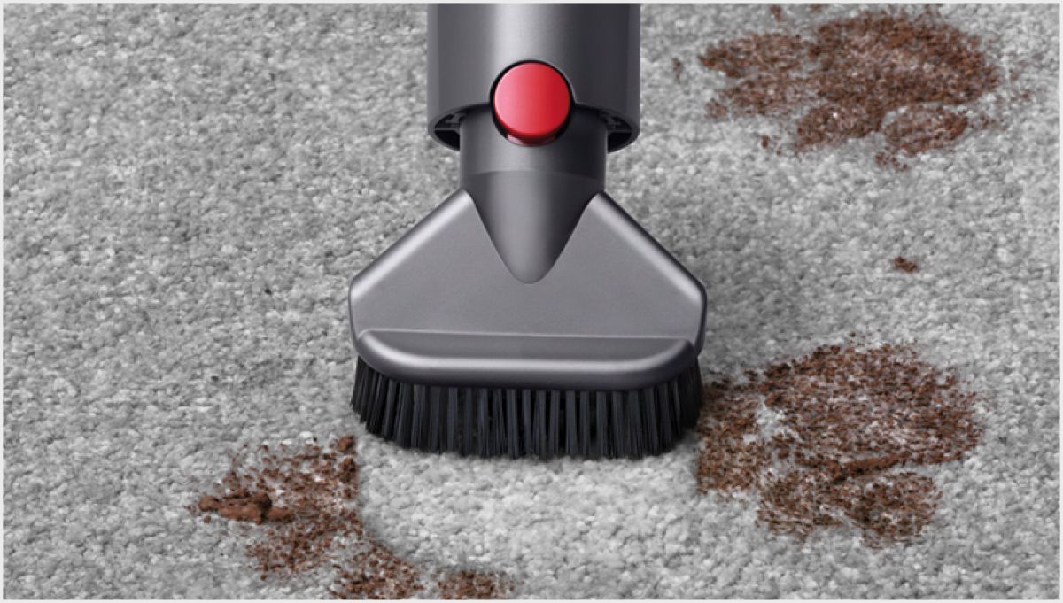 Stubborn dirt brush loosening and picking up dust