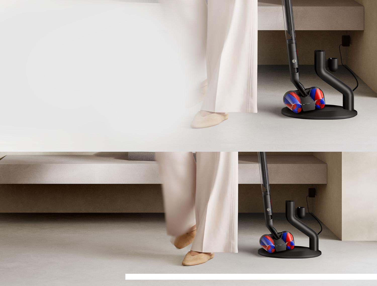 The Dyson PencilVac cleaner being put onto its charging dock
