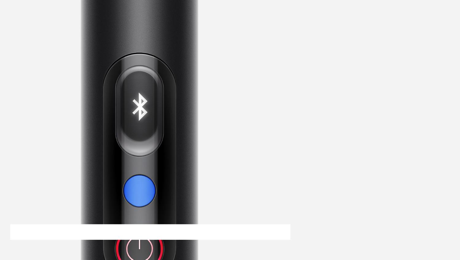 A close up of the LCD screen of the Dyson PencilVac cleaner, showing a Bluetooth symbol