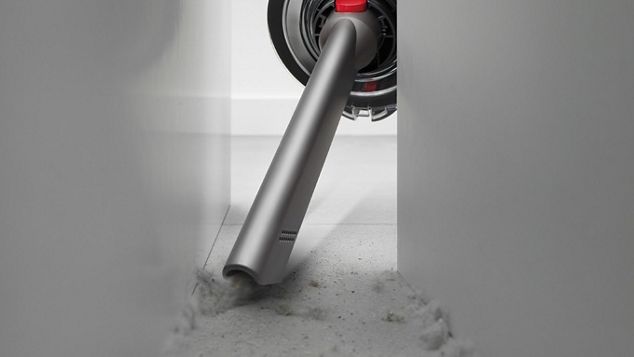 Crevice tool reaching into a tricky space.