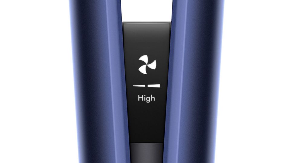 A close-up of the Dyson Airstrait airflow control button.