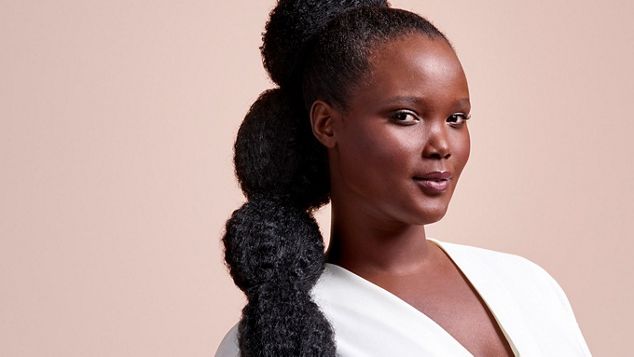 Model wearing a stretched bubble puff ponytail style.
