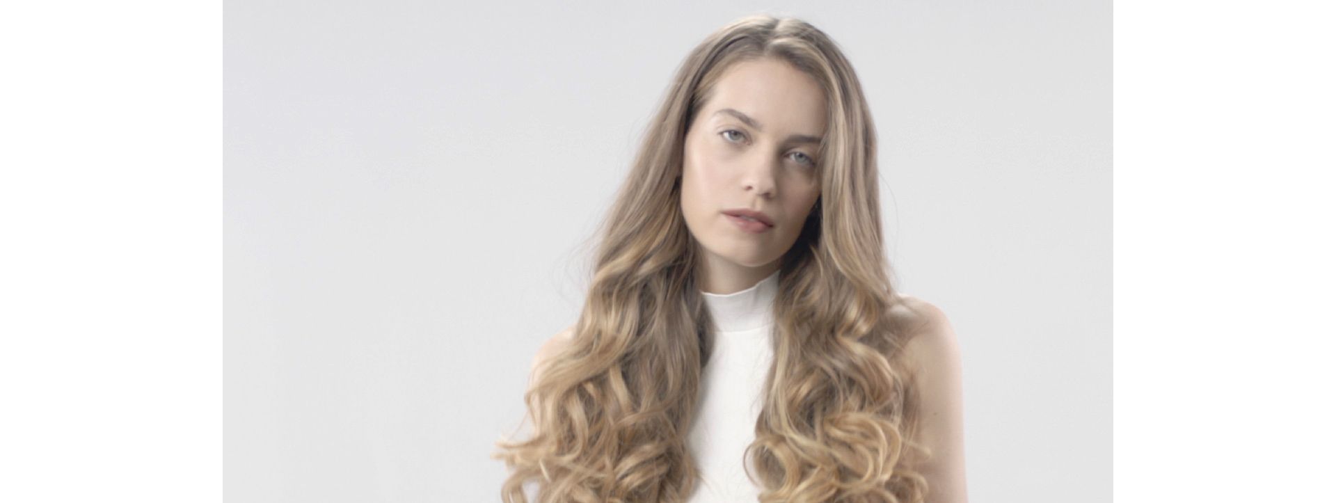 Lady with dark, straight, smooth hair.