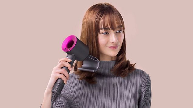 Model with long, straight hair.