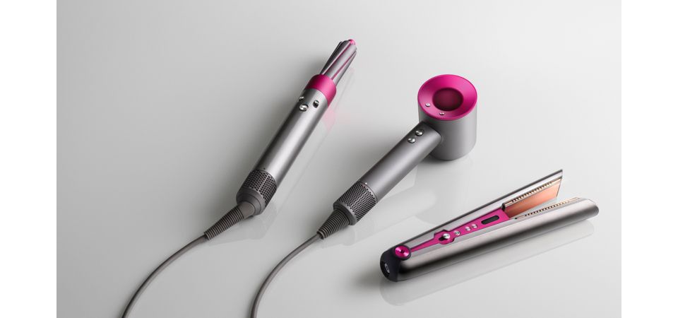 Dyson Corrale, Airwrap and Supersonic on a table