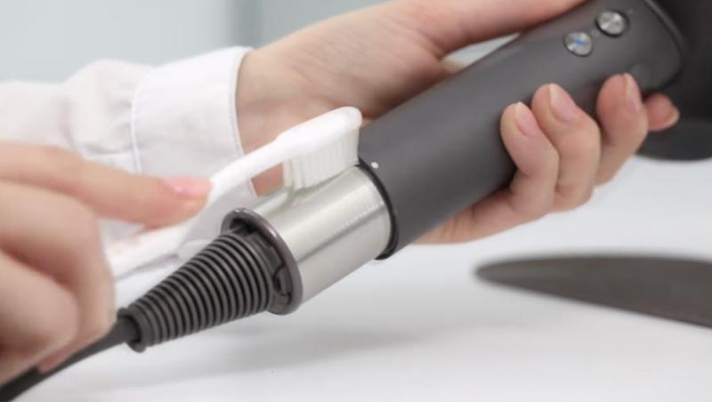 Brushing gently with a toothbrush