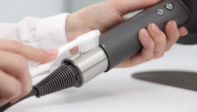 Brushing gently with a toothbrush