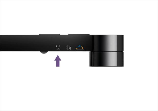 Button furthest from optical head that auto-adjusts brightness