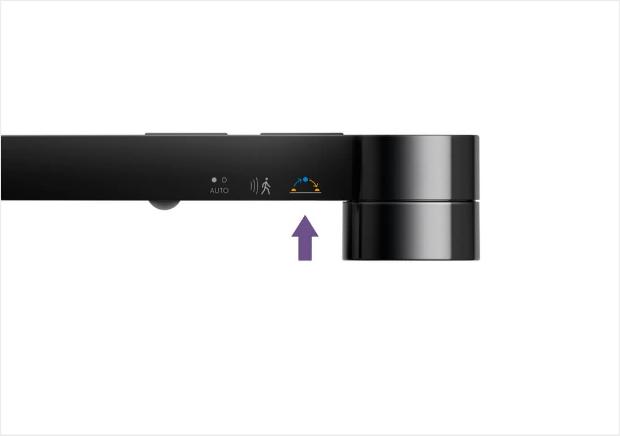 Button closest to optical head that sets light to adjust with daylight