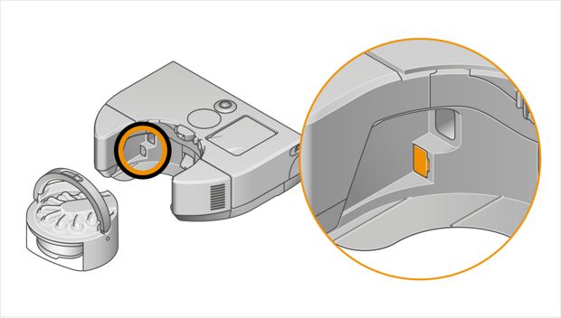 Ilustracja przedstawiająca robota z wyjętym pojemnikiem na zanieczyszczenia