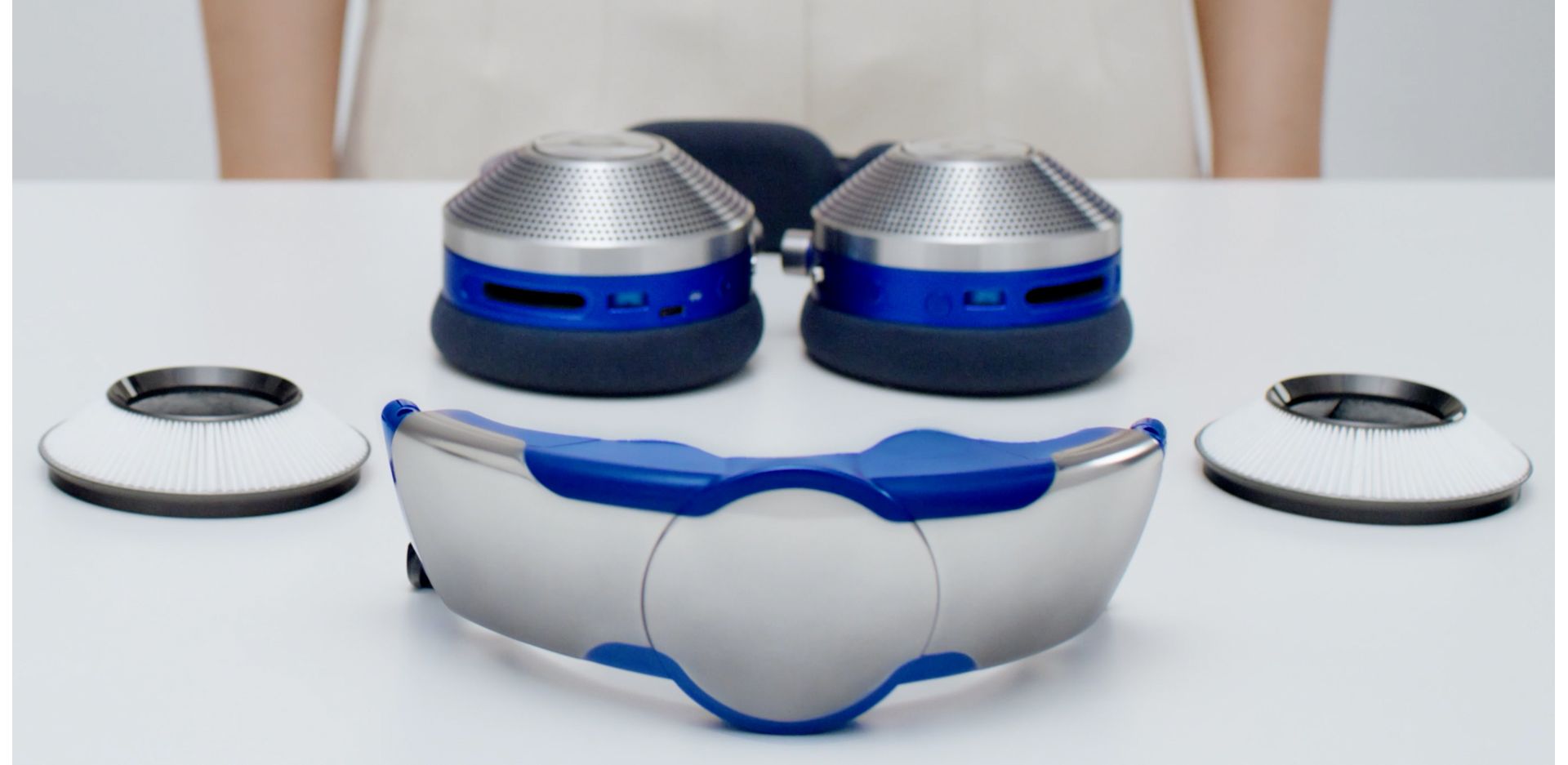 All the parts of the Dyson Zone headphones on a table top