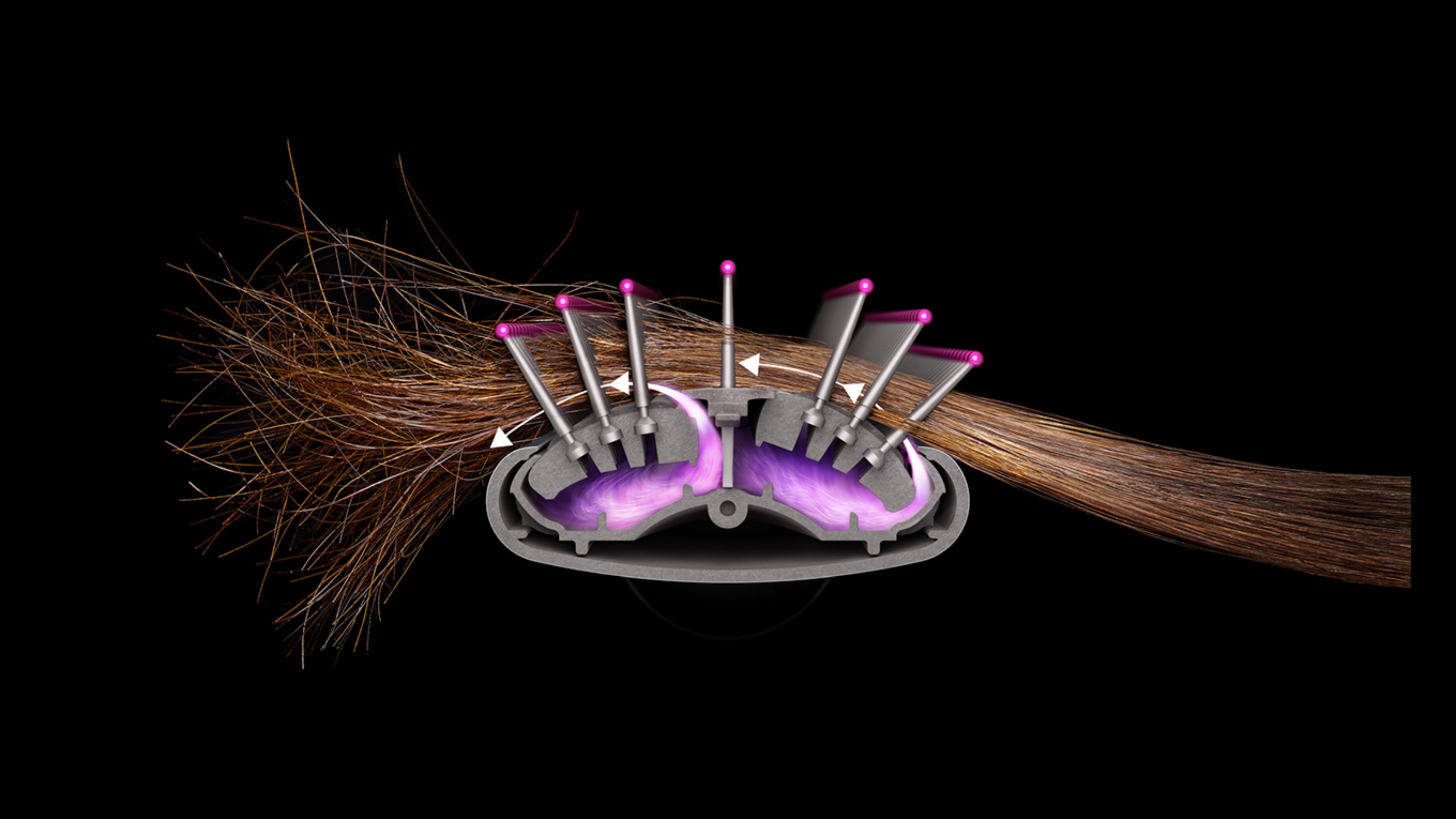 Close-up of smoothing brush on hair