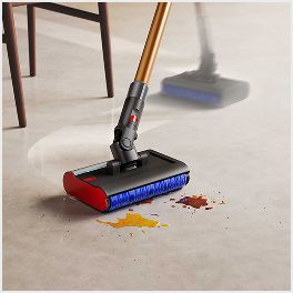 The Dyson PencilWash cleaner used to clean a spill on a hard floor