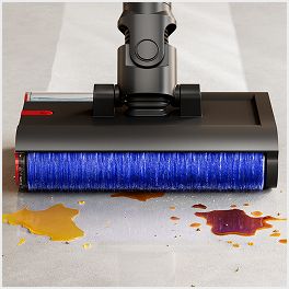 Close-up of the Dyson PencilWash cleaner head as it cleans wet and dry debris.