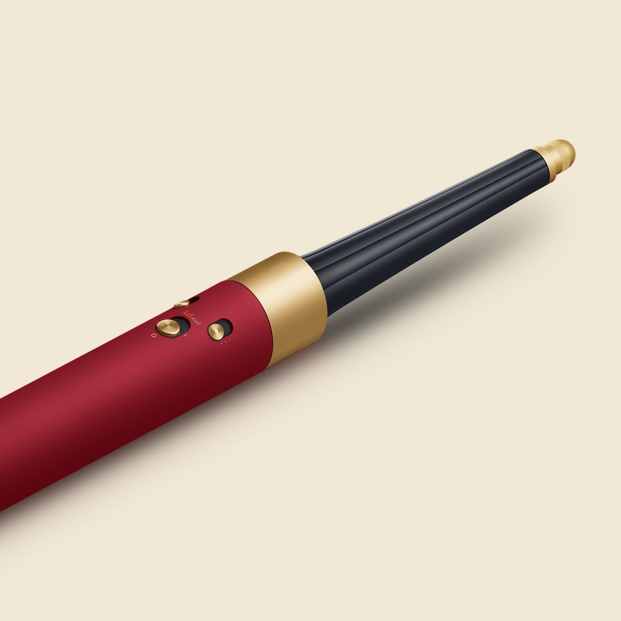 The Dyson Airwrap i.d. multi-styler and dryer in Red velvet and gold.