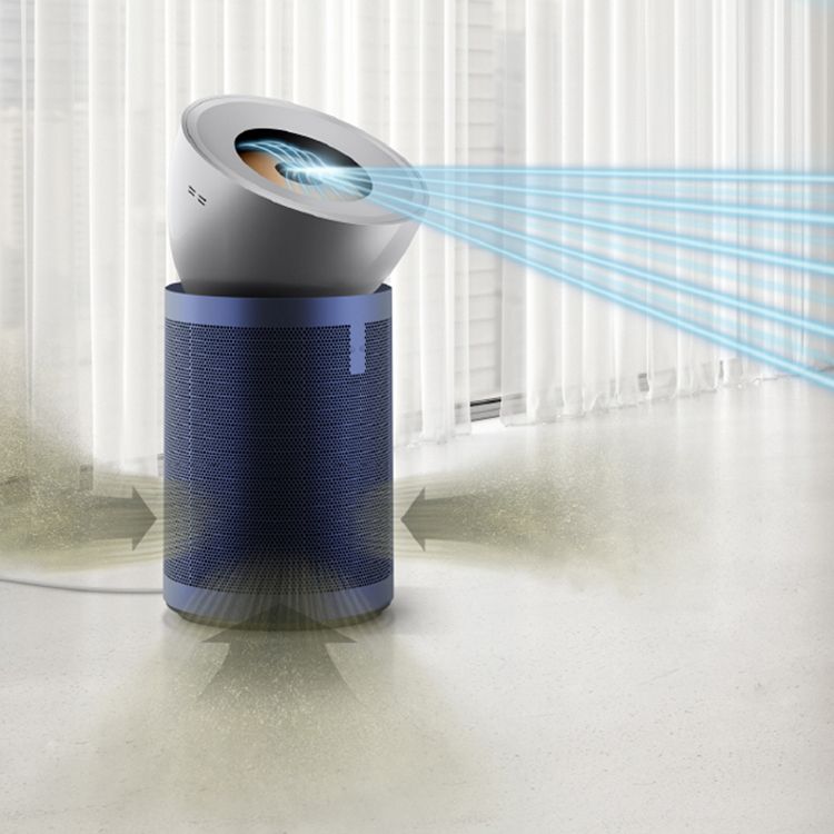 The Dyson Purifier Big+Quiet Formaldehyde in Prussian Blue/Silver draws in pollutants and projects a stream of purified airflow into a clean, minimal room