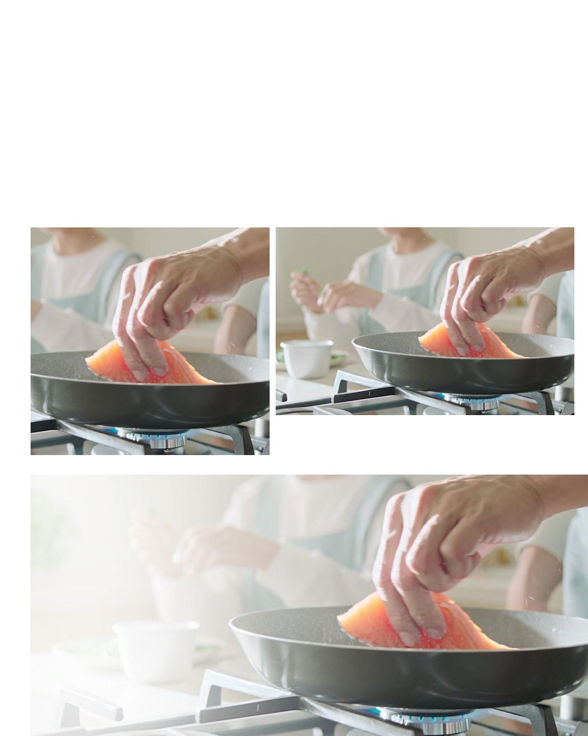 A close-up of a frying pan on a gas hob, frying some salmon. A close-up of a frying pan on a gas hob, cooking a piece of salmon.