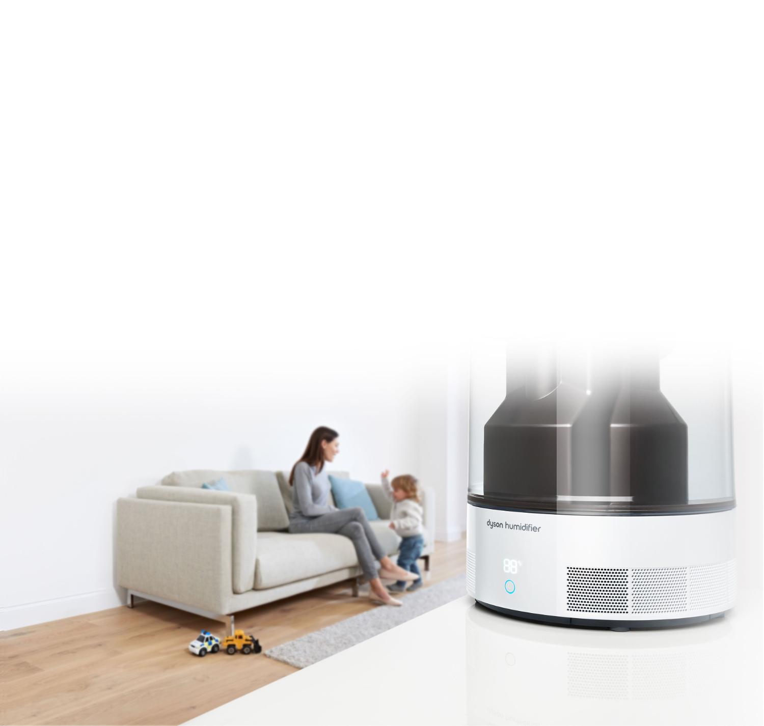 Dyson humidifer close up with mother and child in background