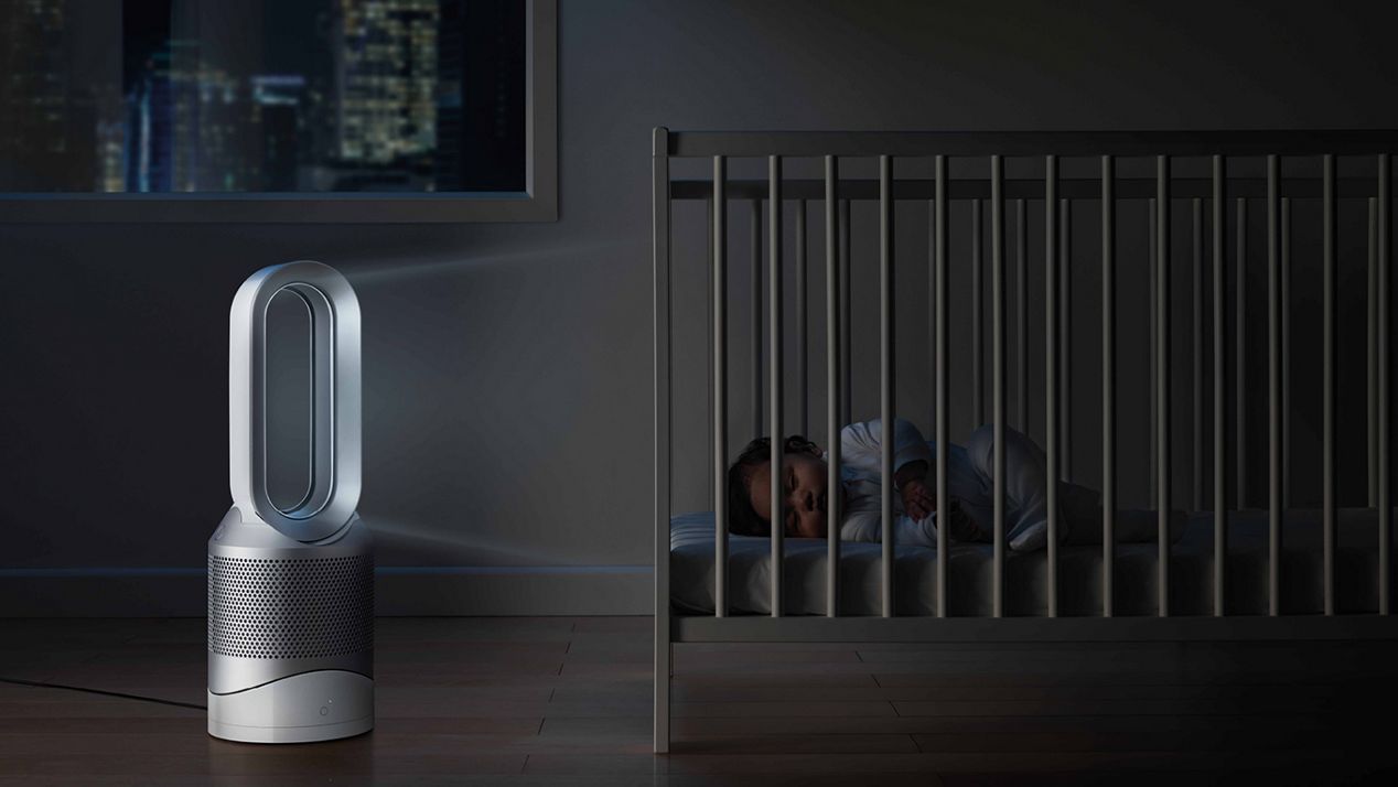 Dyson Pure Hot+Cool purifier fan heater in bedroom with sleeping child