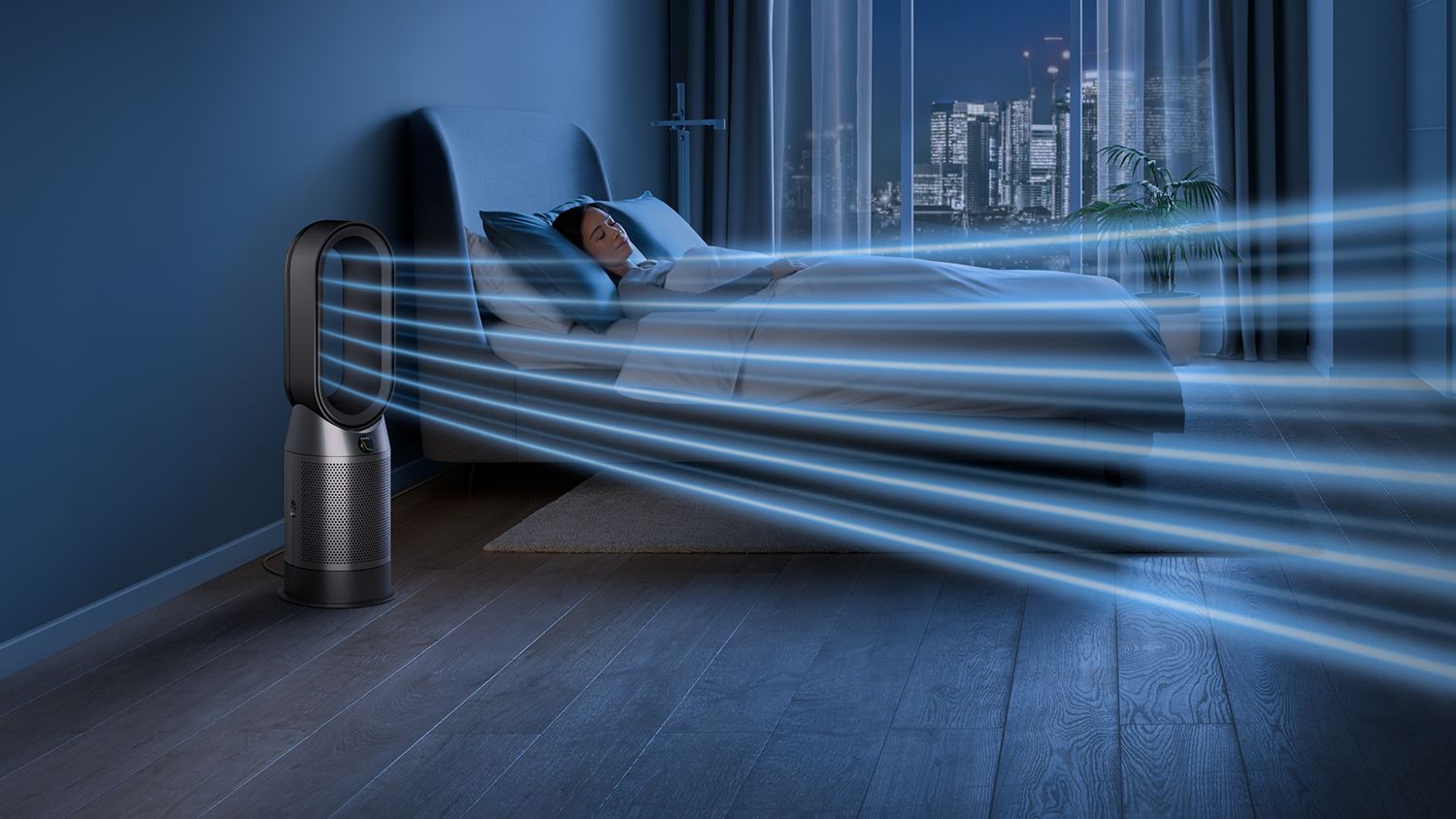 The Dyson Purifier Hot+Cool HP1 heating purifier operating in Night mode next to a sleeping person.