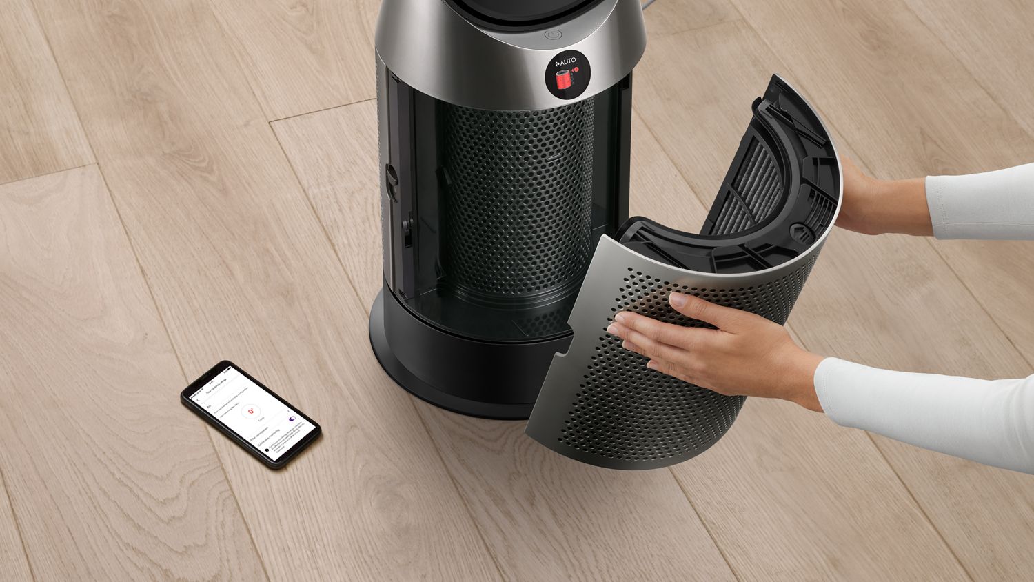 The Dyson Purifier Hot+Cool HP1 heating purifier filter being removed.