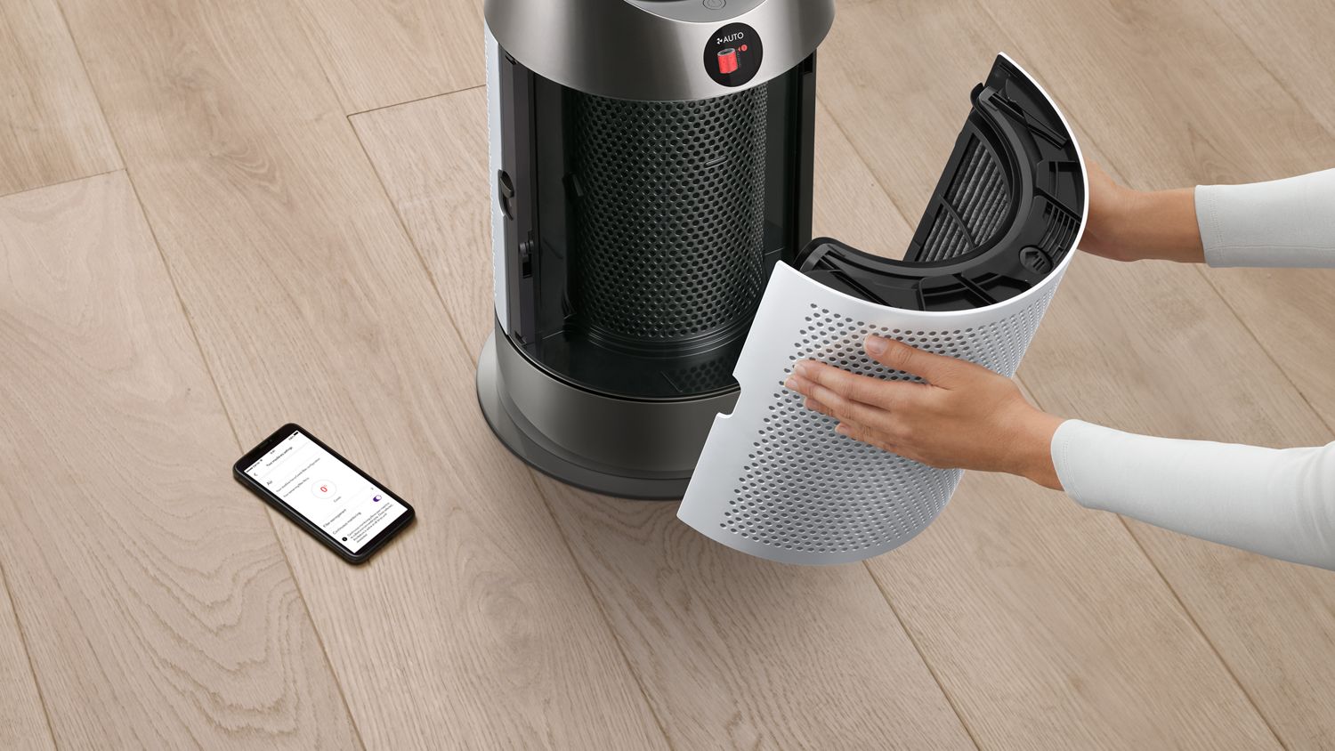 The Dyson Purifier Hot+Cool HP1 heating purifier filter being removed.