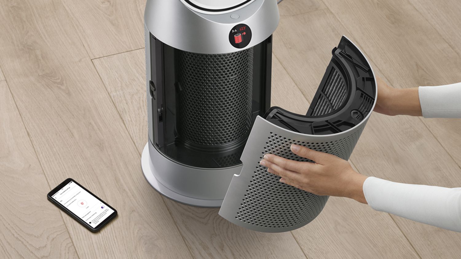 The Dyson Purifier Hot+Cool HP1 heating purifier filter being removed.