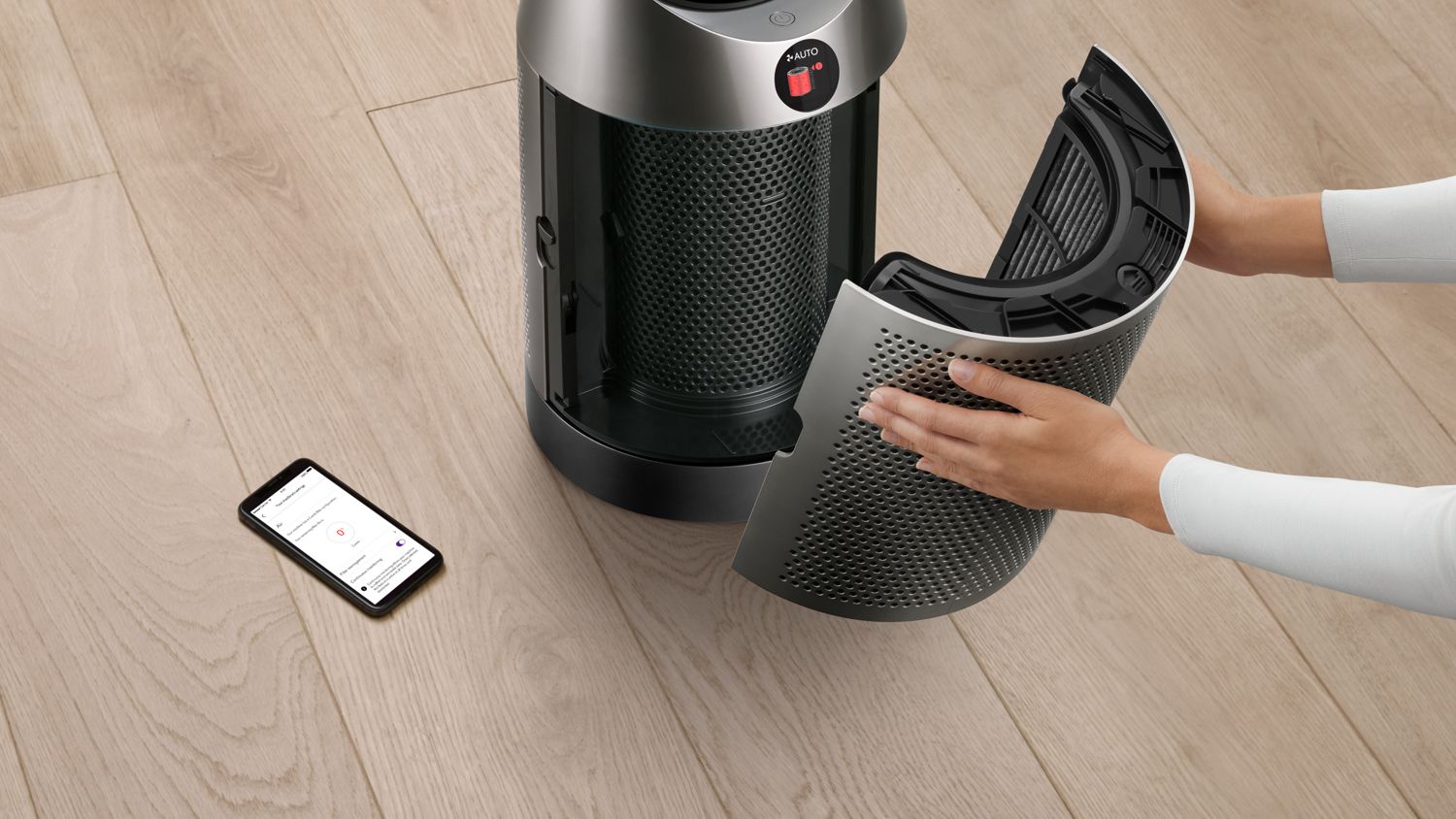 The Dyson Purifier Cool PC1 air purifier filter being removed.